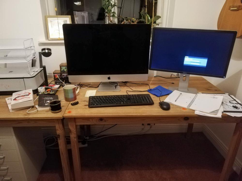 A photo of my work from home space, desk, computer