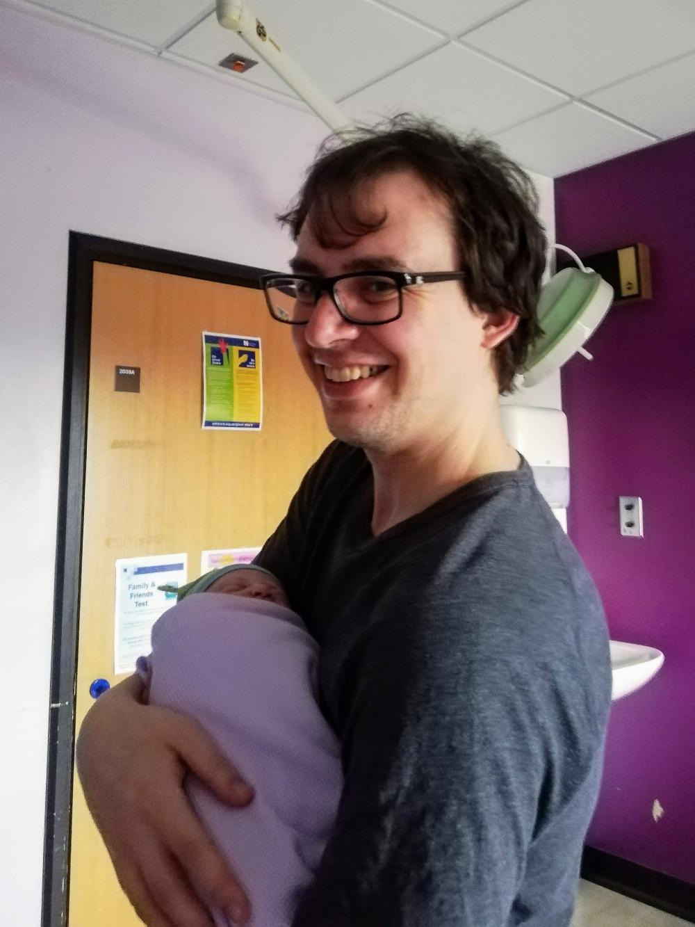 Me holding Lily for the first time.